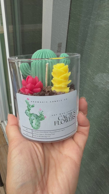Cactus flowers and jade candle